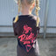 the front side of a young girl in a wakeboard division t shirt